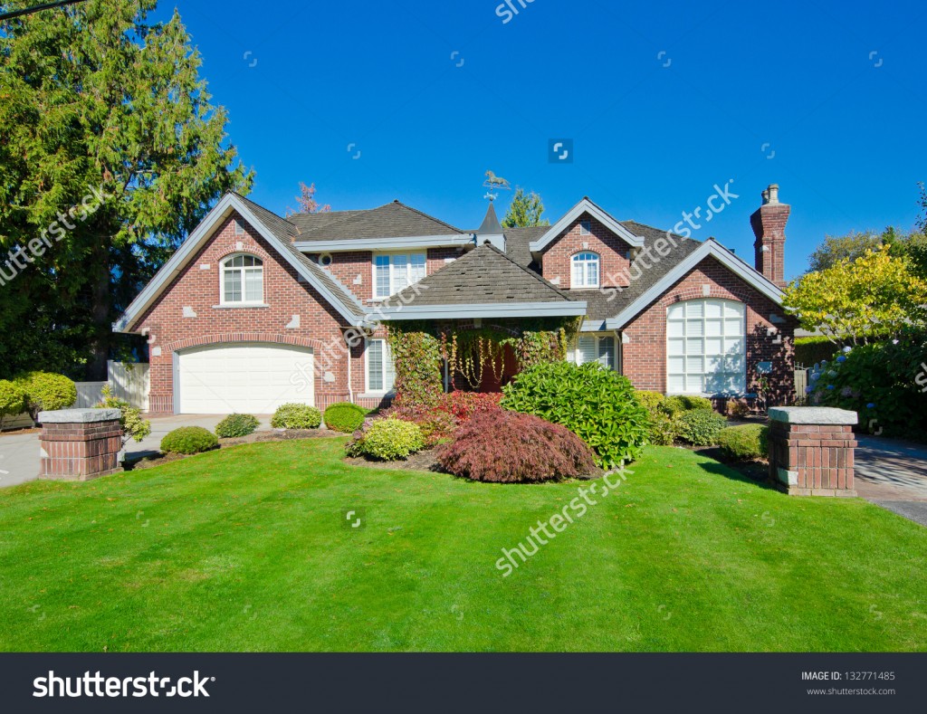 stock-photo-big-custom-made-luxury-house-with-nicely-trimmed-and ...